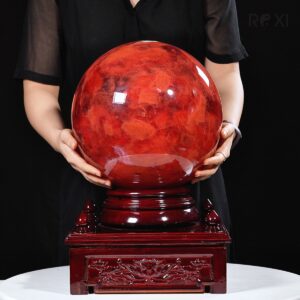Alternative view of Quả cầu obsidian đỏ 27,3kg - 28,4cm + đế đèn xoay tự động